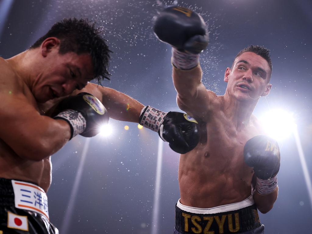 Tim Tszyu punches Takeshi Inoue, who was able to last the 12 rounds despite an onslaught from the Australian star. Picture: Mark Kolbe/Getty Images