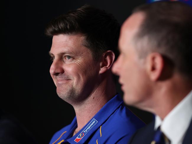 PERTH, AUSTRALIA - SEPTEMBER 30: Andrew McQualter, senior coach of the Eagles looks on as Don Pyke addresses the media during a West Coast Eagles AFL press conference at Mineral Resources Park on September 30, 2024 in Perth, Australia. (Photo by Paul Kane/Getty Images)