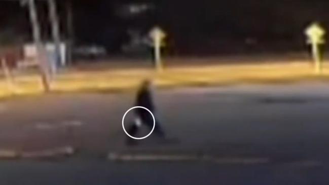 CCTV footage shows a teenager wielding a knife before being shot by police. picture: 7 News ,