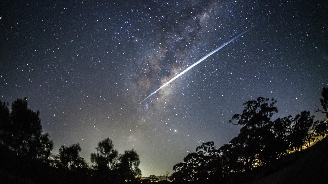 A long-exposure photo of Starlink satellites streaking across the night sky. Picture: Rodd Westwood