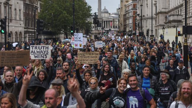 Anti-mask protesters participate in the Unite for Freedom protest outside Downing Street on August 29 in London. Speakers, including Jeremy Corbyn's brother Piers Corbyn.