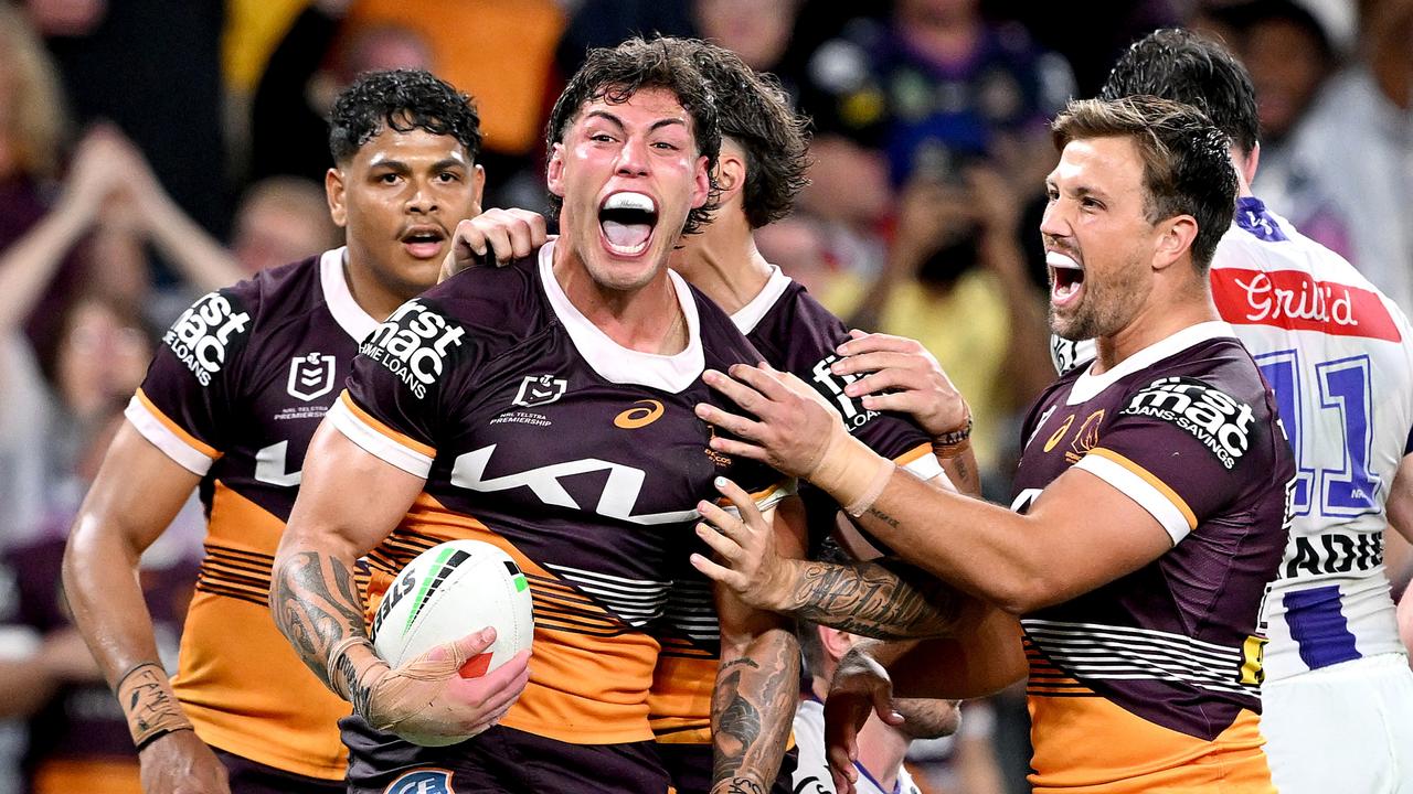 Jordan Riki of the Broncos celebrates a try against the Storm. Picture: Getty