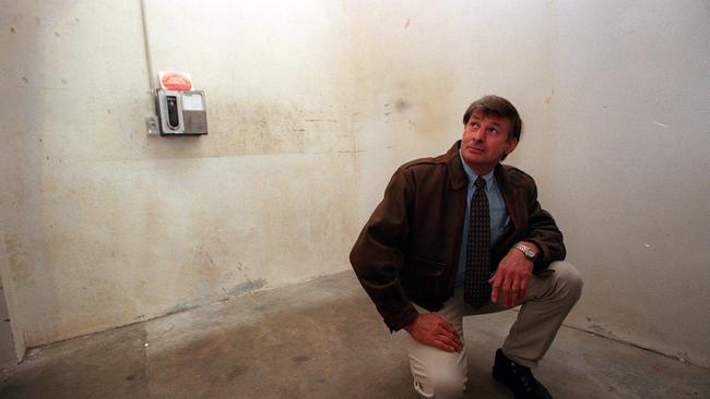 SA murder where bodies were found in barrels in strong room vault of former State bank building in Snowtown. Police officer Denis Edmond inside the now empty bank vault. Picture: Mangan.