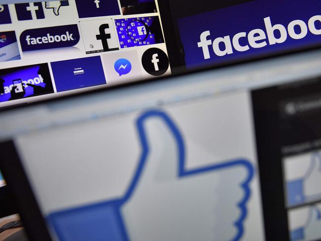 (FILES) This file photo taken on November 20, 2017 shows logos of US online social media and social networking service Facebook. Facebook said on March 20, 2018 it is 'outraged' by misuse of data by Cambridge Analytica, the British firm at the centre of a major data scandal rocking Facebook, who suspended its chief executive as lawmakers demanded answers from the social media giant over the breach. / AFP PHOTO / LOIC VENANCE