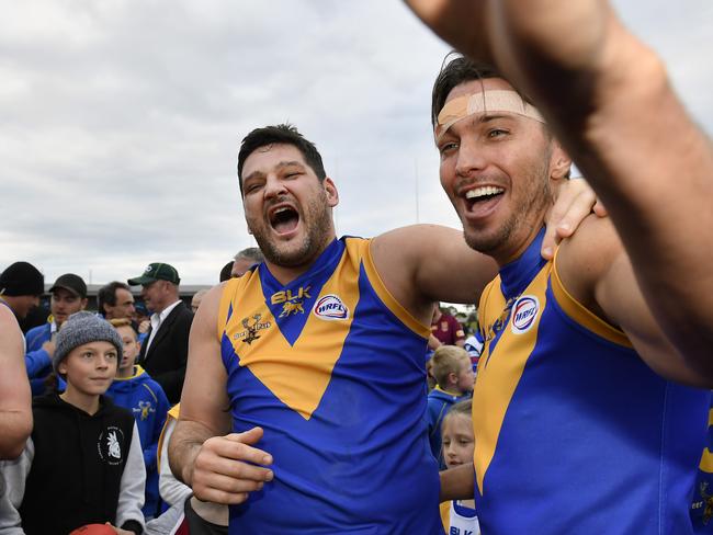 Deer Park's Brendan Fevola and Ryan Houlihan celebrate winning the game. Picture: Andy Brownbill