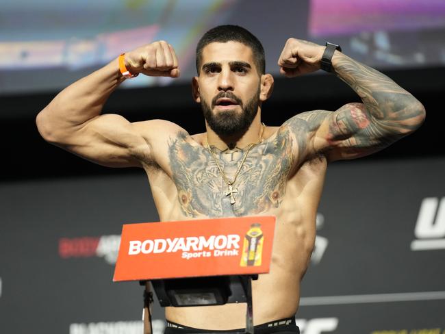 LAS VEGAS, NV - DECEMBER 09: Ilia Topuria steps on the scale for the ceremonial weigh-in during the weigh-in for UFC 282 - Blachowicz vs Ankalaev on December 9, 2022, at MGM Grand Garden Arena in Las Vegas, NV, United States. (Photo by Louis Grasse/PxImages/Icon Sportswire via Getty Images)