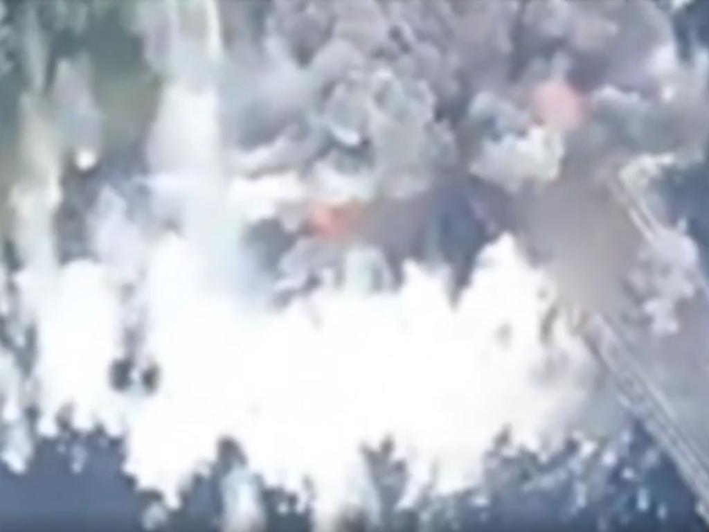 Aerial footage posted by Air Force Commander Mykola Oleschuk shows a large explosion causing a section of bridge to collapse. Picture: Ukrainian Air Force via Storyful