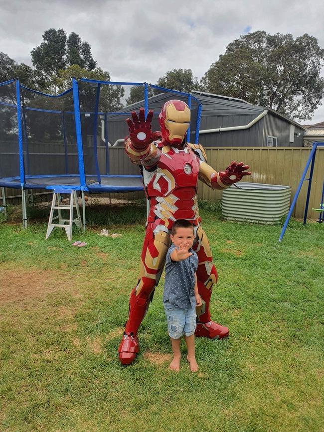 Sam with his favourite super hero, Iron Man.