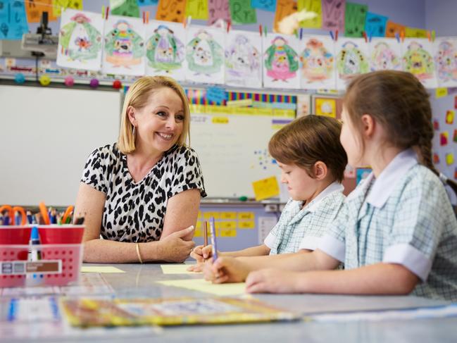 Generic picture of teacher with two young school students. Picture: Supplied