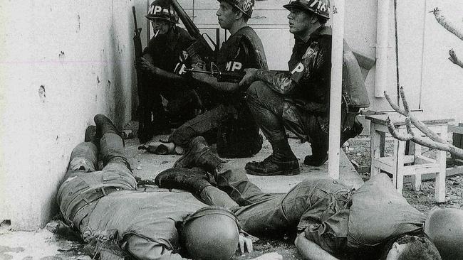 US soldiers lie dead next to military police outside the US embassy in Saigon.