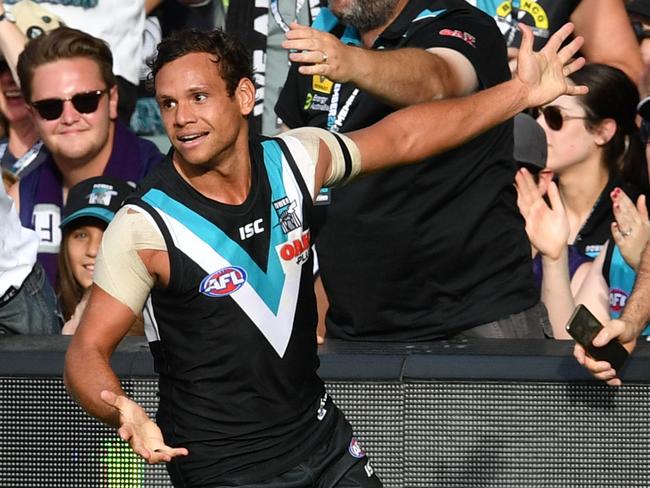 Steven Motlop of the Power celebrates a goal during the Round 1 AFL match between the Port Adelaide Power and the Fremantle Dockers at Adelaide Oval in Adelaide, Saturday, March 24, 2018. (AAP Image/David Mariuz) NO ARCHIVING, EDITORIAL USE ONLY