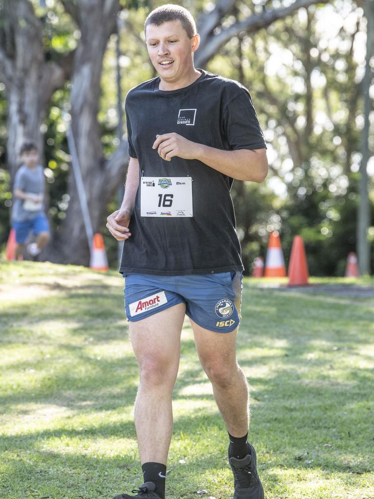 Ben Brunner finishes the 2km. Top of the Range adventure trail run at Picnic Point. Sunday, April 2, 2023. Picture: Nev Madsen.