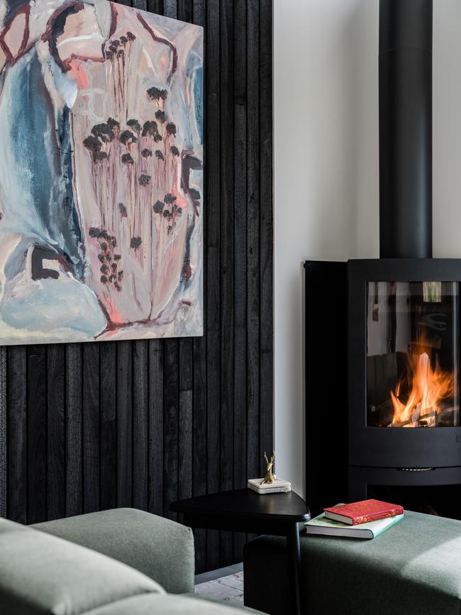 The cosy freestanding wood heater at Kittawa Lodge. Picture: Adam Gibson