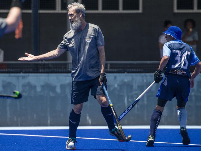 Action in the Pan Pacific Masters Games Hockey tournament. Picture: Glenn Campbell