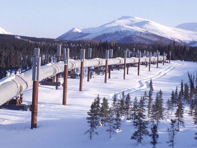 The trans-Alaska pipeline near Valdez, Alaska. The oil-rich state’s revenue has fallen 80% over the past two years as the price of crude has dropped. PHOTO: KIM MINCER/PLANET PIX/ZUMA PRESS