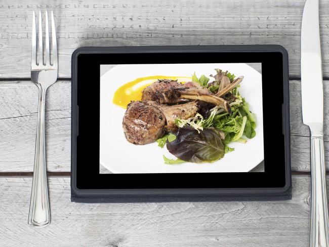 Online ordering food concept with table setting and meal course on a tablet screen Picture: iStock