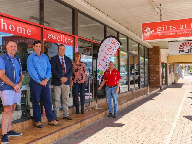 SHOP LOCAL: Supporting the new Shop Local resource kit are (from left) Visit Roma President Charlie Eames, Santos Maranoa Regional Manager Andrew Snars, Mayor Tyson Golder, Councillor Wendy Taylor and Commerce Roma President Cyril Peet.