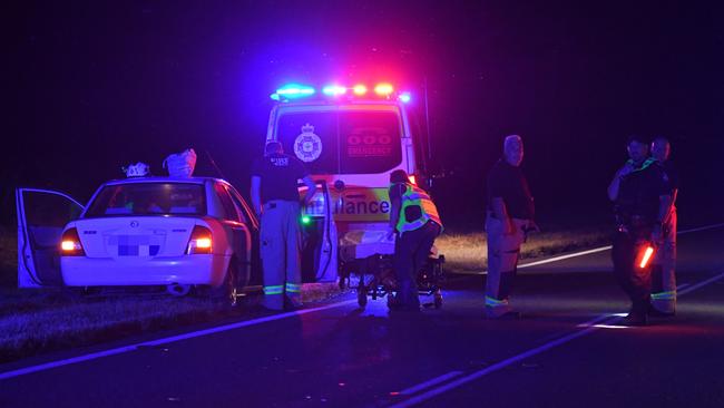 The elderly driver of the car was hurt and taken to Ingham Hospital in a stable condition after striking a cow on the Ingham-Forrest Beach Road in Hinchinbrook Shire about 6.30pm on Monday. Picture: Cameron Bates