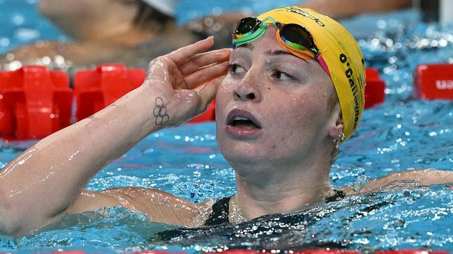 Australia's Mollie O'callaghan reacts after winning the final of the women's 200m freestyle swimming event during the Paris 2024 Olympic Games at the Paris La Defense Arena in Nanterre, west of Paris, on July 29, 2024. (Photo by Oli SCARFF / AFP)