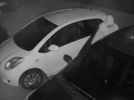 A car in the estate being broken into by a hooded individual. Picture: supplied ,