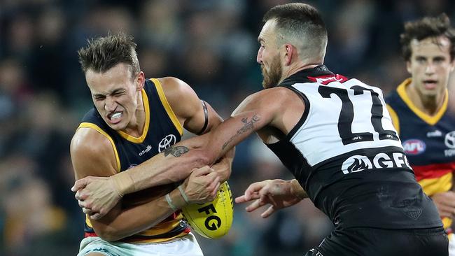 Tom Doedee had a busy night in defence against a rampant Power outfit. Picture: Sarah Reed/AFL Photos via Getty Images