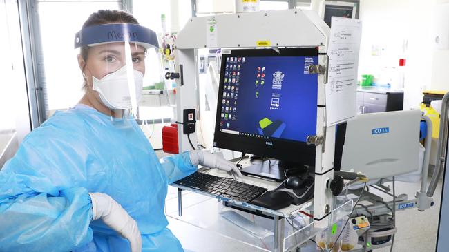 Megan Davis spends 12 hours monitoring the vital signs and tending to the needs of a single patient during a normal shift. Picture: AAP/Claudia Baxter