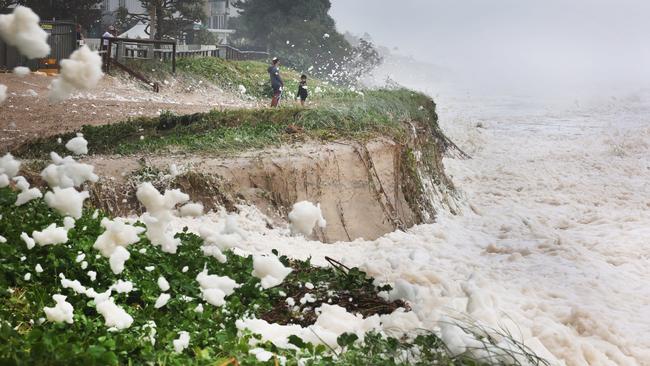 Gold Coast battered by Cyclone Alfred, as it made land. Erosion and foam make for a spectacle at Main Beach. Picture Glenn Hampson