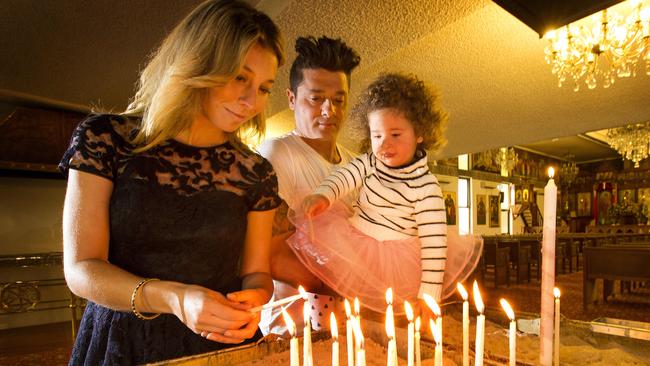 Bessie Kay with husband George and daughter Indiana at the Greek Orthodox in Oakleigh. Picture Norm Oorloff