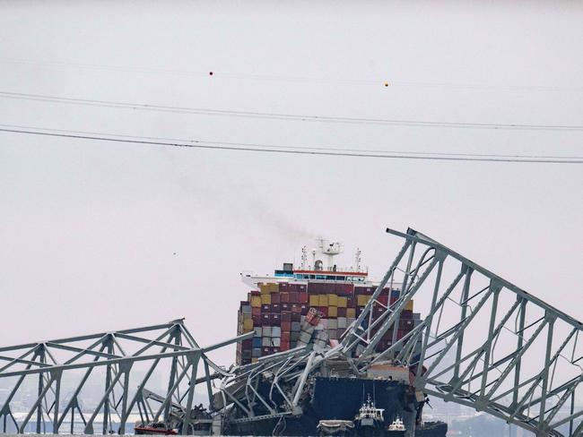 The collapsed Francis Scott Key Bridge lies on top of the container ship Dali in Baltimore. Picture: AFP