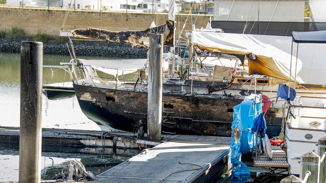 A boat at Hope Harbour Marina which was badly damaged in last night’s fire. Picture: Jerad Williams