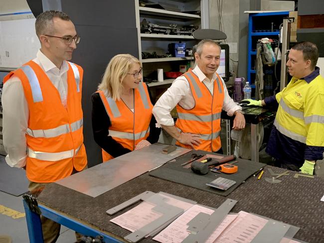 WA premier Roger Cook, second from right, at Unique Metal Works in Wangara on Friday. Labor candidate for Lansdale Daniel Pastorelli is on left, treasurer and deputy premier Rita Saffioti is second from left. Picture - Paul Garvey.