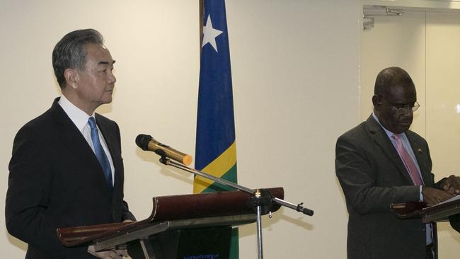 Mr Wang and Solomon Islands Foreign Minister Jeremiah Manele in Honiara on Thursday. Picture: AFP