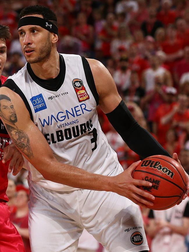 Josh Boone will have his work cutout trying to stop Andrew Bogut. Picture: Getty Images