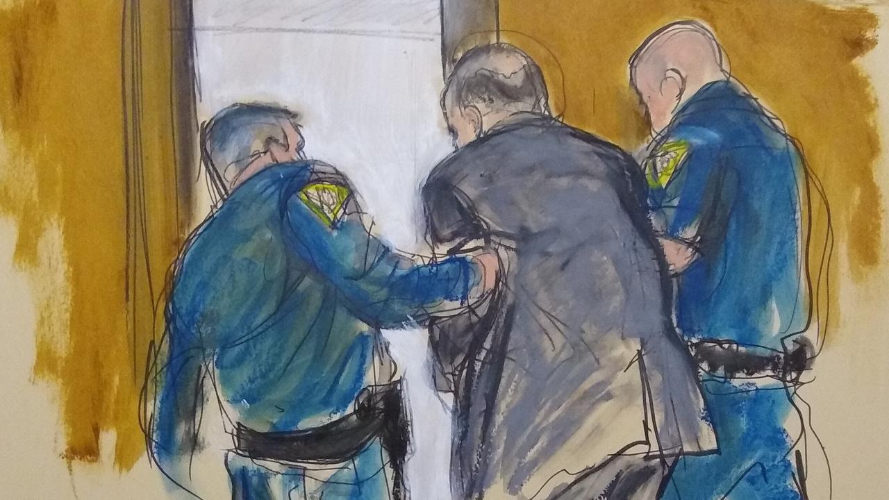 In this courtroom sketch, Harvey Weinstein, is led out of Manhattan Supreme Court after a jury convicted him of rape and sexual assault. Picture: Elizabeth Williams via AP