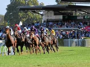 The massive crowd enjoys a memorable Ipswich Cup Day with friends and watching the racing. Picture: Rob Williams