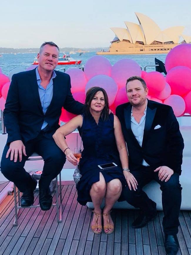 Natalie Joyce with political lobbyist Michael Kauter, right, and his partner, David Gracey on the birthday cruise. Picture: Facebook