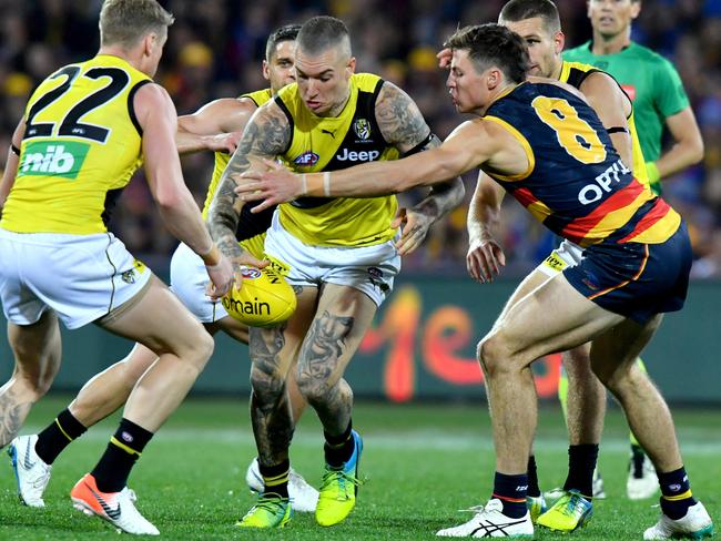 Crows defender Jake Kelly takes on Richmond’s Dustin Martin during Adelaide’s 33-point win over the Tigers at Adelaide Oval. Picture: AAP Image/Sam Wundke