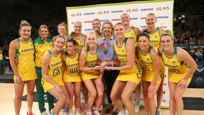 The Diamonds with the trophy after their Netball Quad Series matchagainst New Zealand Silver Ferns at Hisense Arena in Melbourne on Sunday.