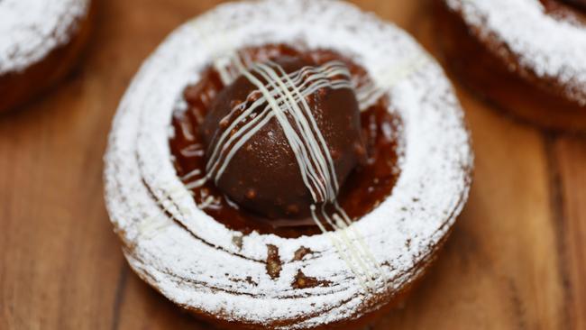 Pictured at Bar Mammoni on Loftus Lane at Circular Quay is a tray of Hot Cross Bussant made in time for Easter. Picture: Richard Dobson