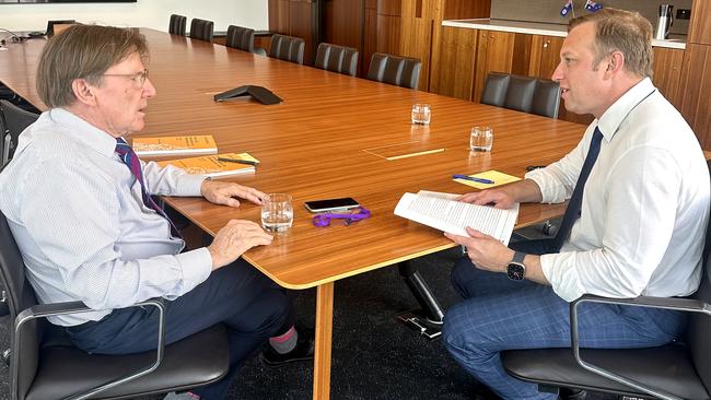 Professor Peter Coaldrake (left) meets with Premier Steven Miles.