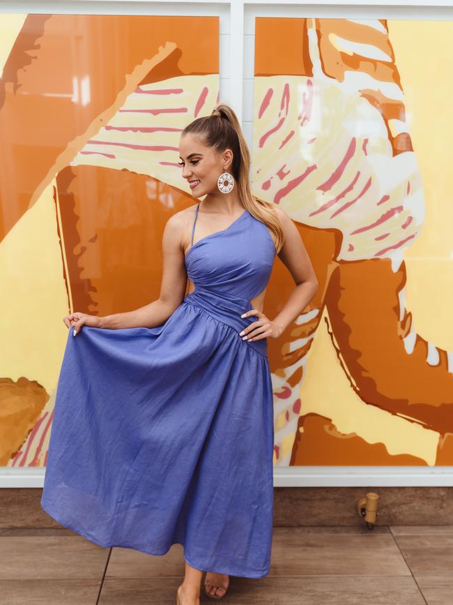 Kate George wearing a Zimmermann Tropicana Asymmetric dress in electric blue at Crystalbrook Flynn styled by Bella Sinopoli. Picture Micah Hart, The Social Impact