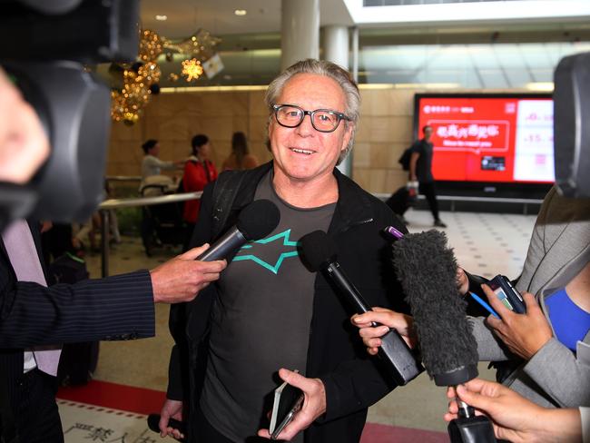 Wayne “Wollongong Whiz” Gardner shows relief to be in Sydney after spending 12 days in a Japanese jail. Picture: Andrew Murray.