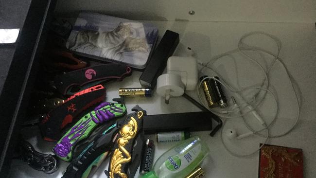 Items seized during raids on homes of Mexican Hoon Cartel members.