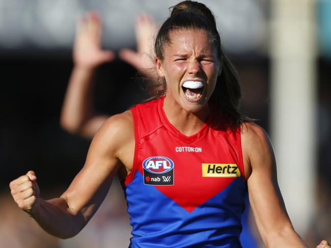 PERTH, AUSTRALIA - MARCH 21: Kate Hore of the Demons celebrates the win during the round eight AFLW match between the Fremantle Dockers and the Melbourne Demons at Fremantle Oval on March 21, 2021 in Perth, Australia. (Photo by James Worsfold/Getty Images)