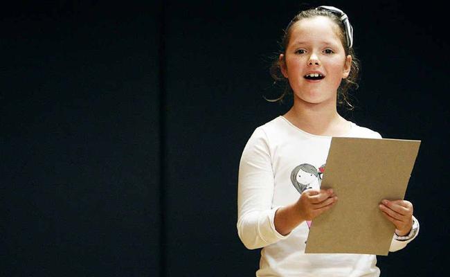 Laura Cameron speaking during the impromptu reading nine years and under section at the Ipswich Junior Eisteddfod. Picture: Photo Claudia Baxter