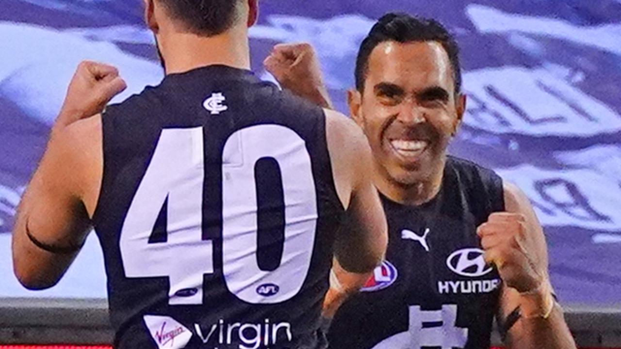 Eddie Betts celebrates after kicking a goal against the Demons. (AAP Image/Scott Barbour)
