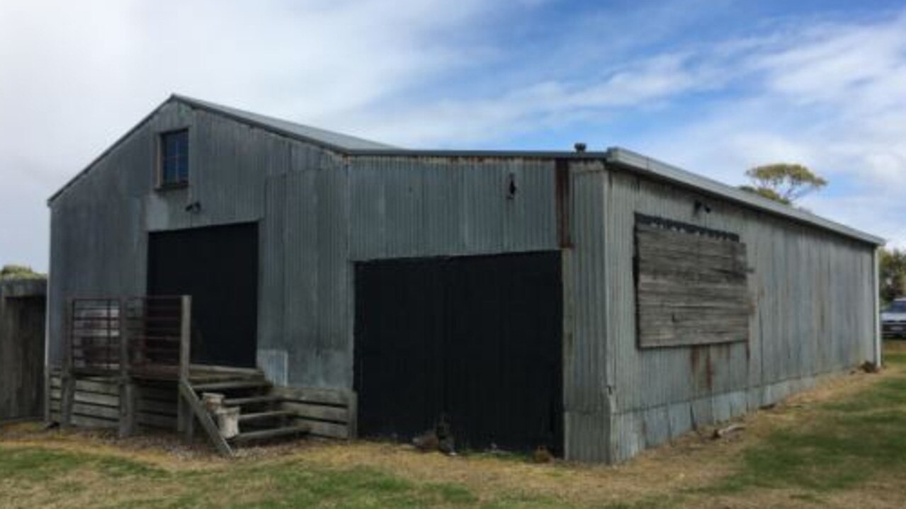 The woolshed prior to its restoration.