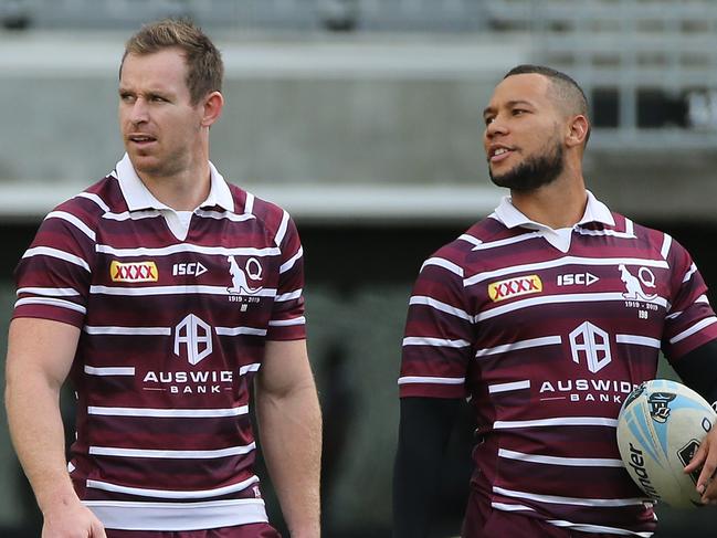 PERTH, AUSTRALIA - JUNE 22: Michael Morgan and Moses Mbye of Queensland walk across the field during the Queensland Maroons State of Origin captain's run at Optus Stadium on June 22, 2019 in Perth, Australia. (Photo by Paul Kane/Getty Images)