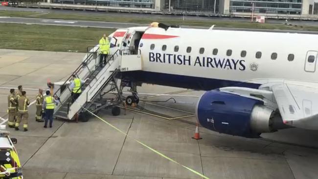 Bronze medal-winning cyclist James Brown was removed fromt he BA plane with a cherry picker Picture: AP