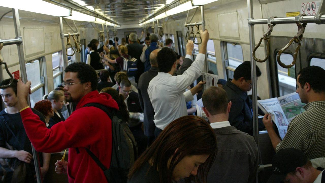 Commuters cram into a train in Perth before coronavirus hit.